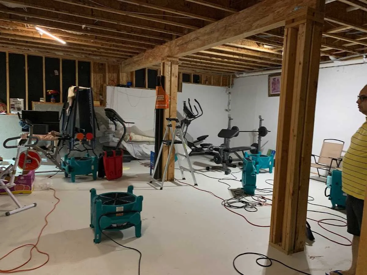 Basement drying equipment setup for Contents Cleaning & Restoration in Excelsior Springs